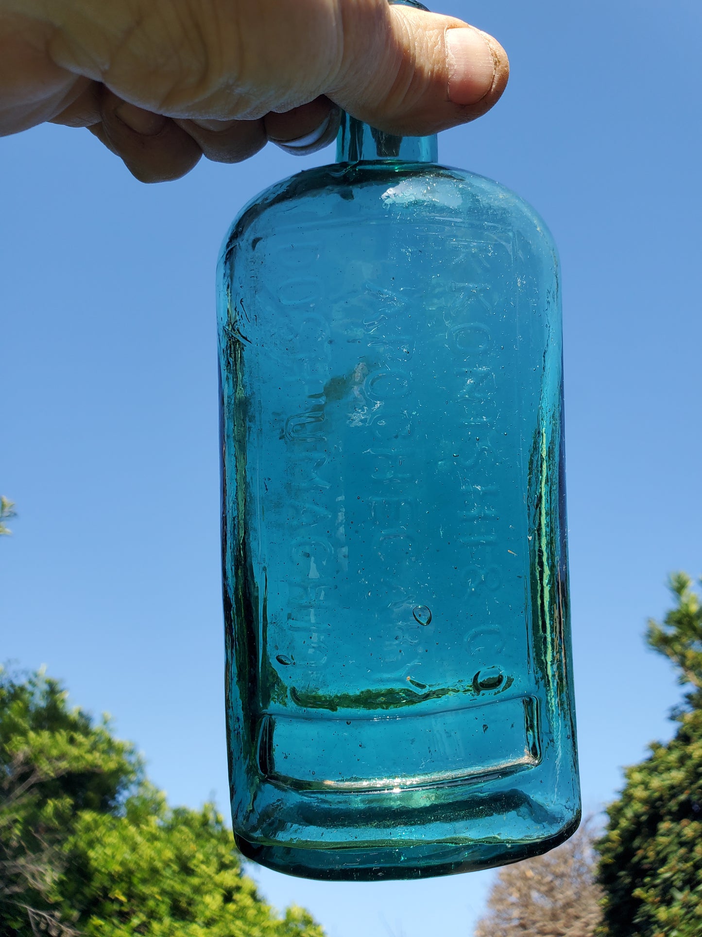 Four (4) matching Dr. Kilmer’s apothecary-style proprietary bottles