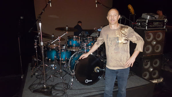 On stage before the concert, at the drums for sound check