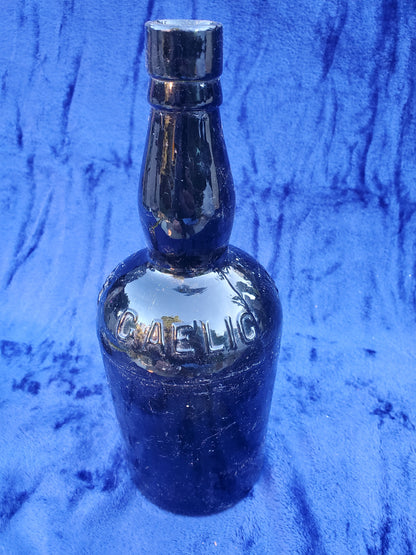 BLACK GLASS WHISKEY BOTTLE