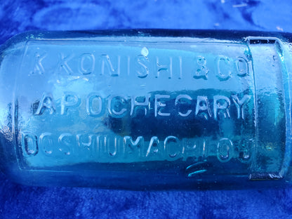 Four (4) matching Dr. Kilmer’s apothecary-style proprietary bottles