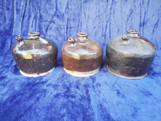 Three (3) authentic late-19th to early-20th-century American stoneware utility jugs