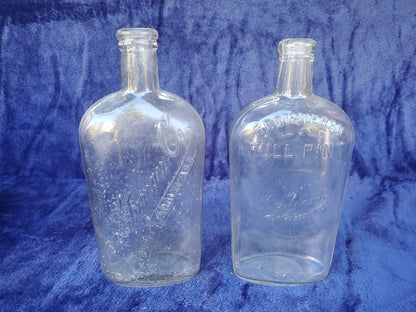 Two (2) Purity Bourbon Flasks - M. Shumate
