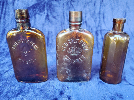 Two (2) Vintage Whiskey Flasks - AMERICUS CLUB WHISKEY