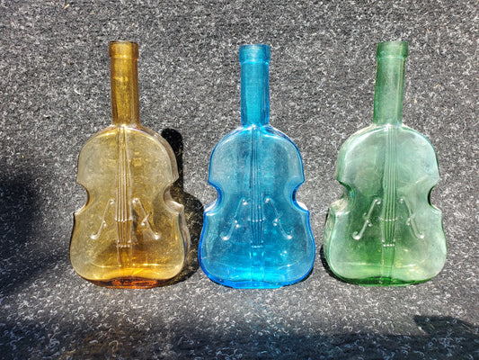 Set of four (4) Figural VIOLIN bottles (amber, 2 blue, green)