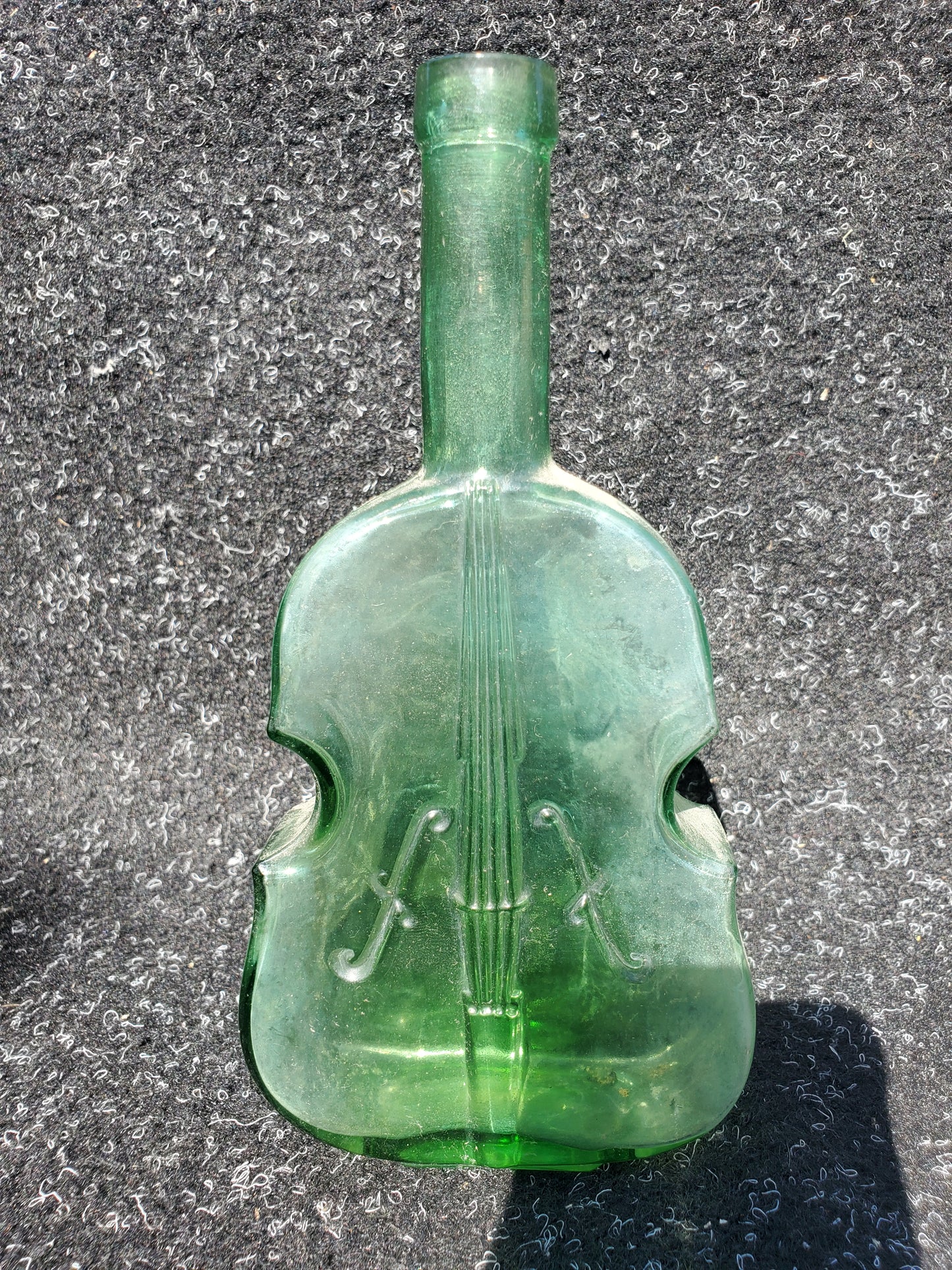 Set of four (4) Figural VIOLIN bottles (amber, 2 blue, green)