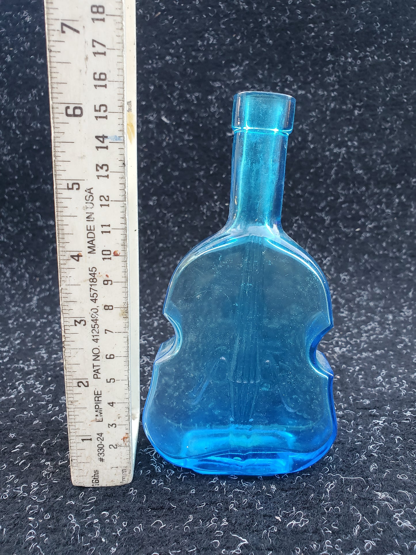 Set of four (4) Figural VIOLIN bottles (amber, 2 blue, green)