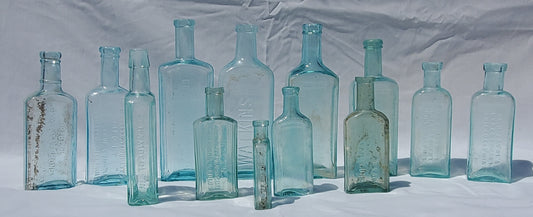 13 Antique Aqua Medicine & Apothecary Bottles – Embossed Glass Collection – 1800s/Early 1900s