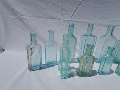 13 Antique Aqua Medicine & Apothecary Bottles – Embossed Glass Collection – 1800s/Early 1900s